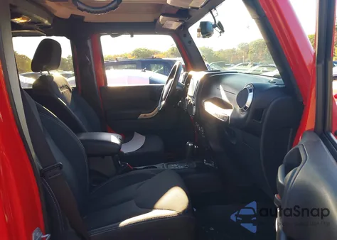 2015 Jeep Wrangler Unlimited Sahara from USA, damaged, VIN 1C4BJWEG9FL594593